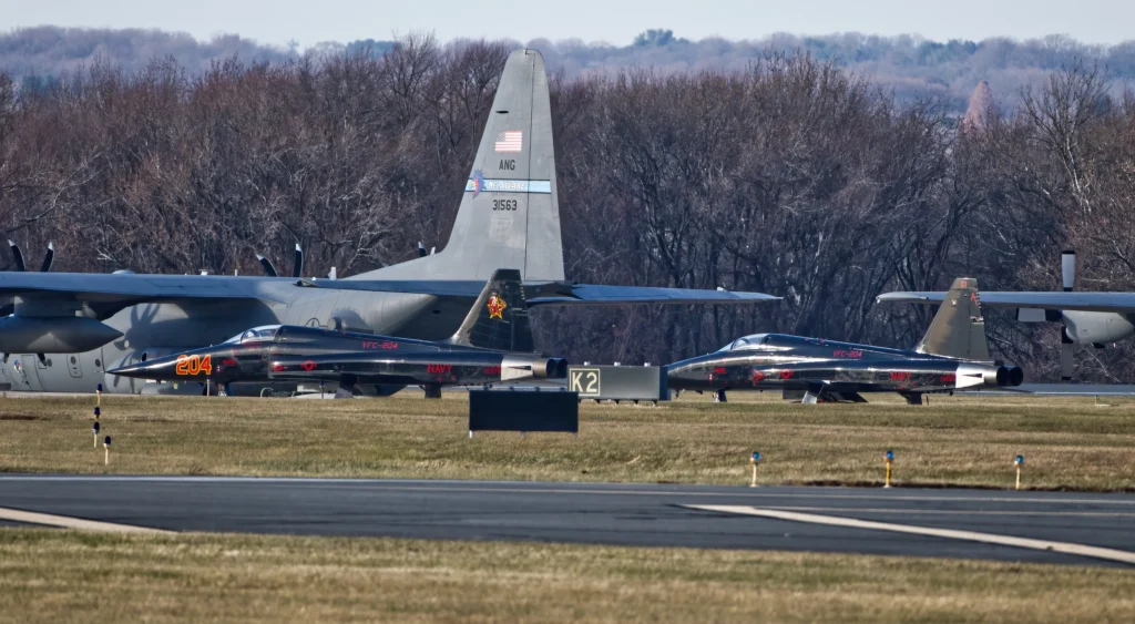 Two F-5 fighters painted in adversary livery at KILG after Philadelphia Eagles stadium flyover December 8, 2024.